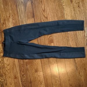 Express size XS black leggings with faux leather side panel